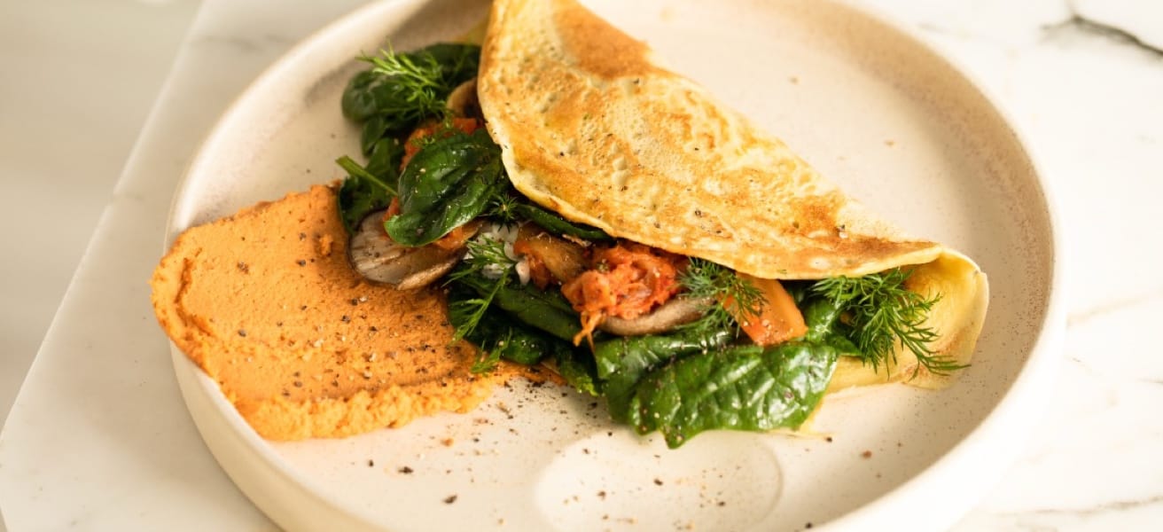 an image of omelette with some vegetables